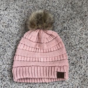 C.C exclusives Fur Pom beanie I a pinky peachy color